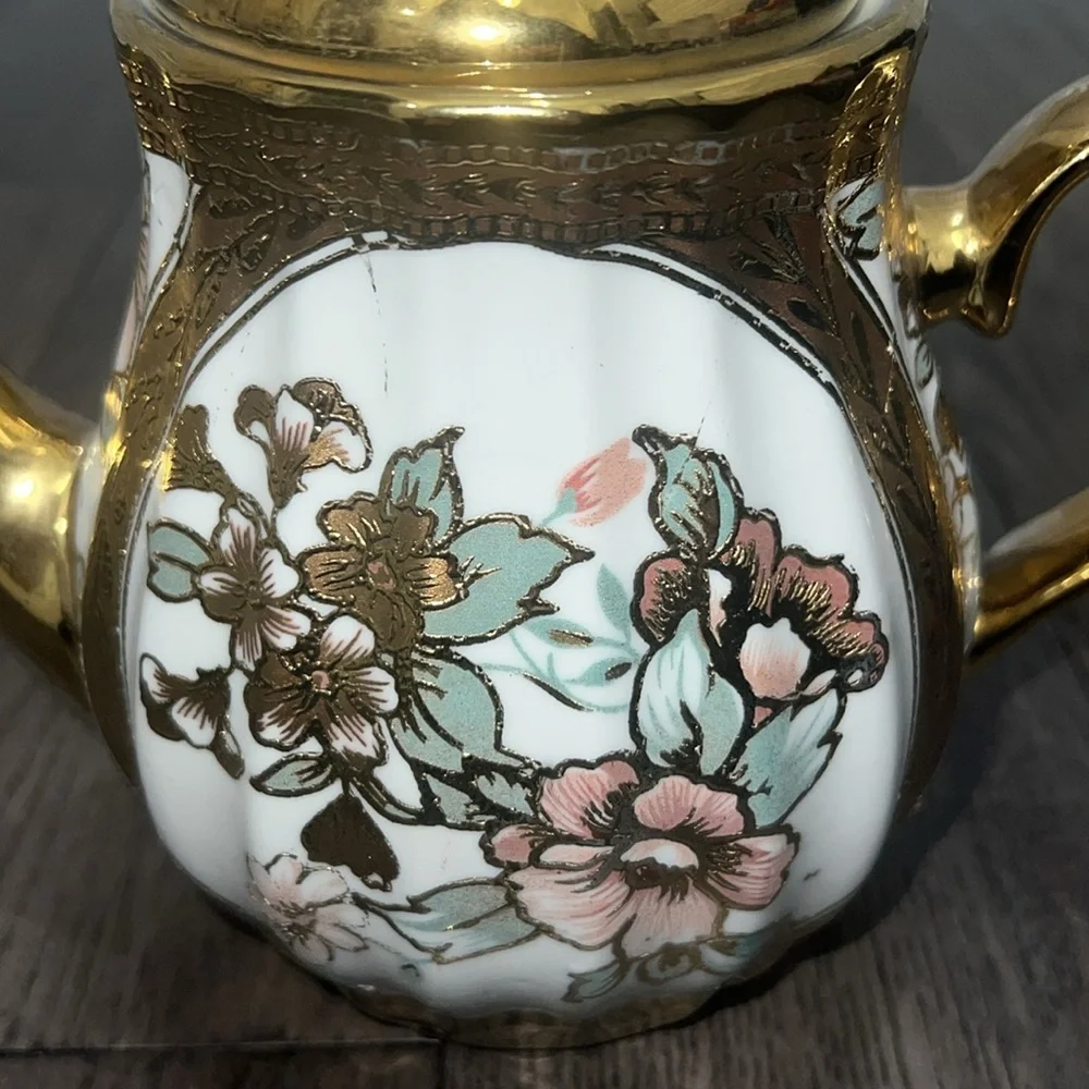 Elegant glass decorative floral teapot
